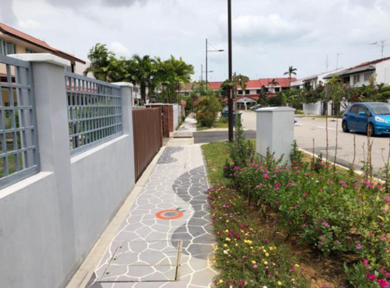Completed heritage-style stone walkway, kerb and landscaping in upgraded residential estate