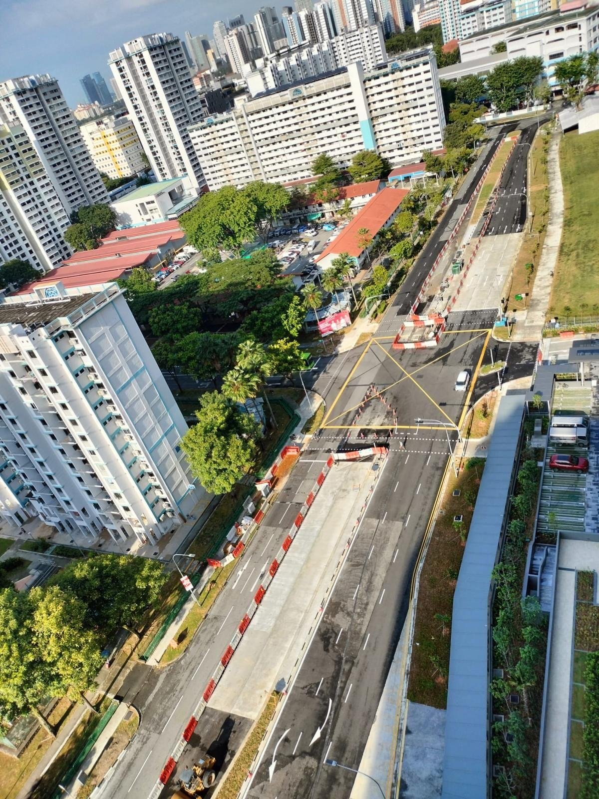 Aerial view of completed road widening project by Buildwick Engineering — dual carriageway with new junction marking, footpath and cycling path