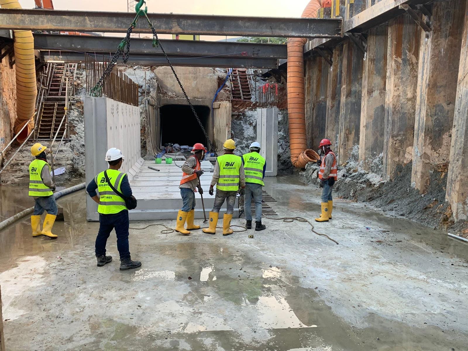 Executed precast drain culvert installation for drainage works, ensuring precise placement and integration within constrained site conditions.